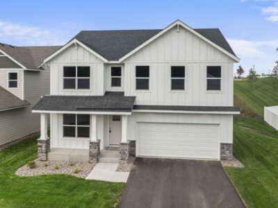 White exterior home with two-car garage