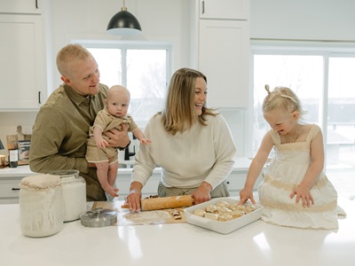 Family in the kitchen making baked goods
